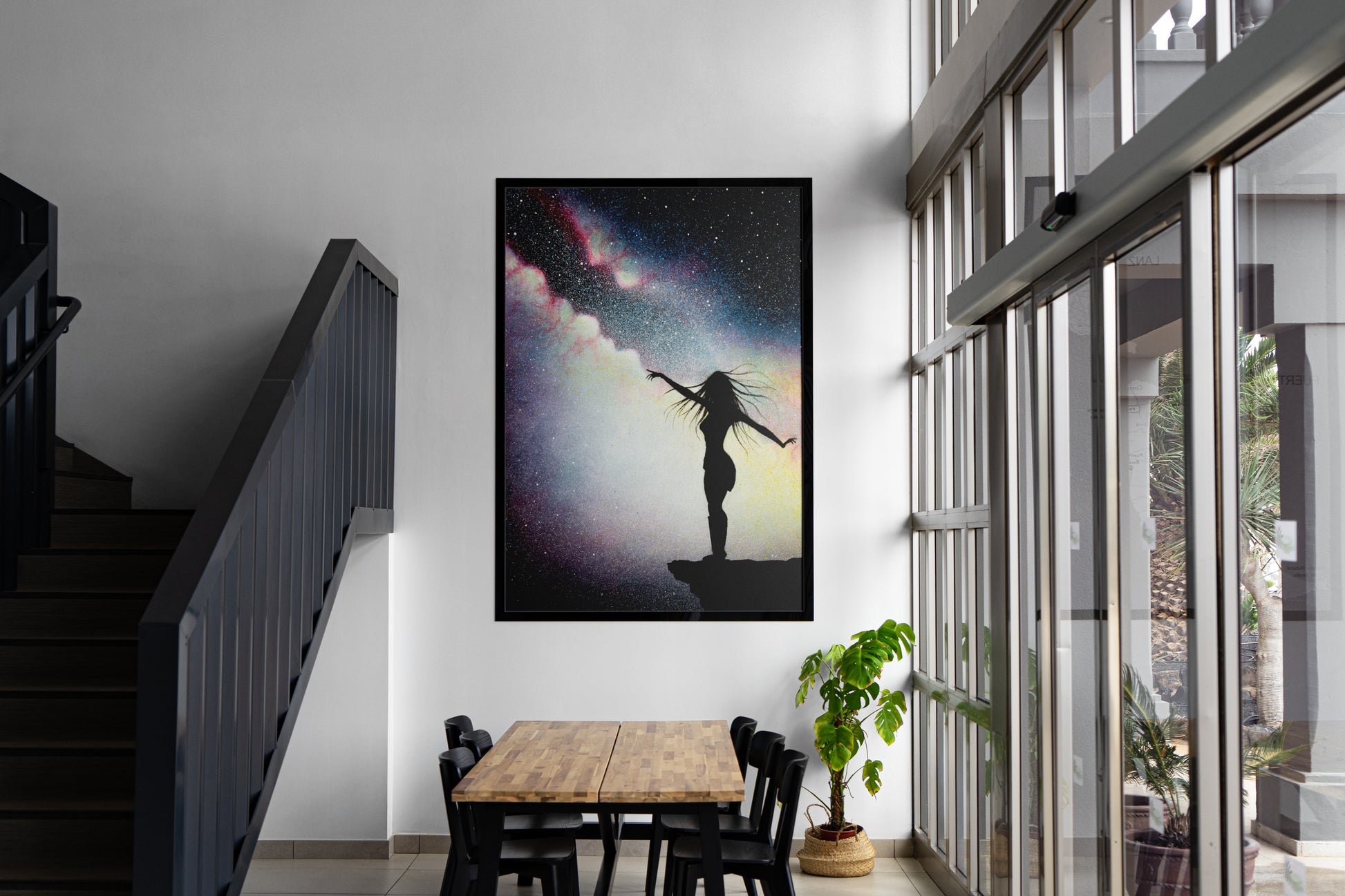 Showcasing an art print of A Sky Full Of Stars by Graham Bradshaw hanging on a wall.