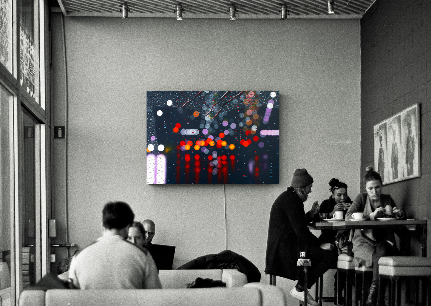 Showcasing an art print of Blinded by the lights by Graham Bradshaw hanging on a wall.